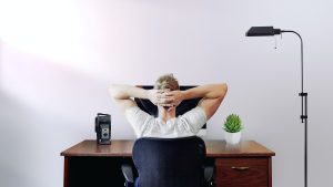 man at a desk working at home