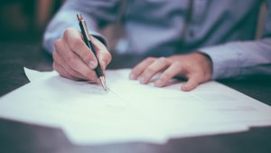 A person signing documents