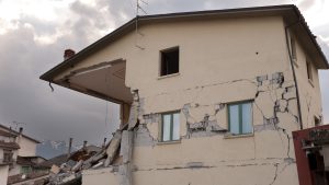 A home severely damaged by an earthquake