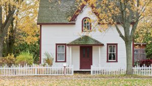 The front of a house during autumn.