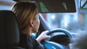 young woman driving a car