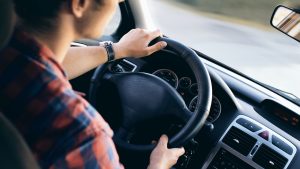 Man driving a vehicle