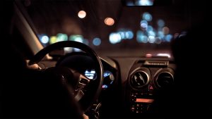 Person driving at night