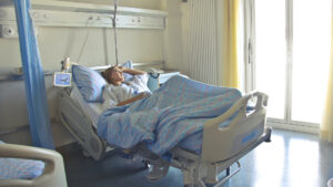 Woman in hospital bed