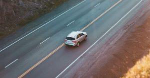 car driving on mountain road