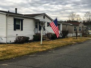 Mobile home with an American flag