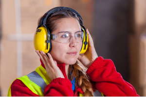 Woman wearing ear and eye protection