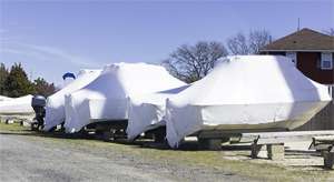 Boats covered by tarps