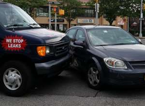 Collision with van and car