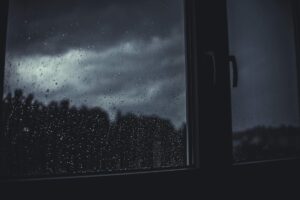 intense storms and rain on a window