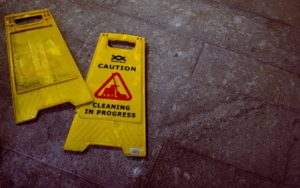 Cleaning in progress sign on the ground