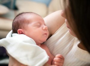 Mother holding a newborn baby